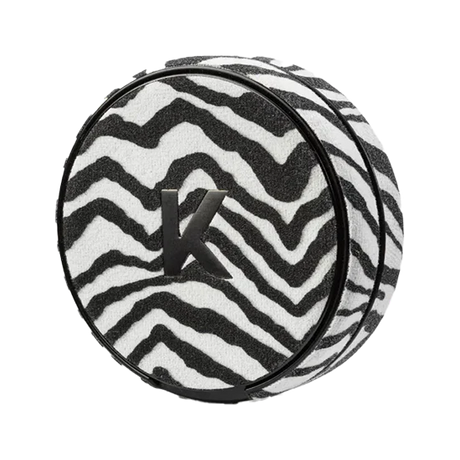 stylish zebra-patterned kelly white zebra kelly refill can with a bold black-and-white design.